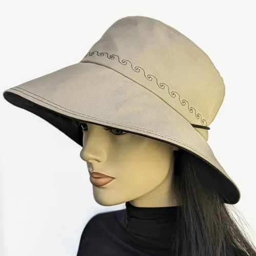 100-a Extra large bucket brim Sunblocker in neutral color with black trim, adjustable fit