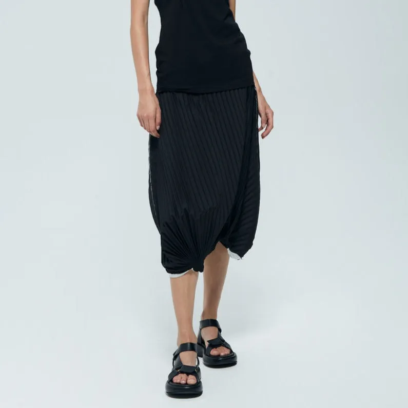 Asymmetric pleated skirt