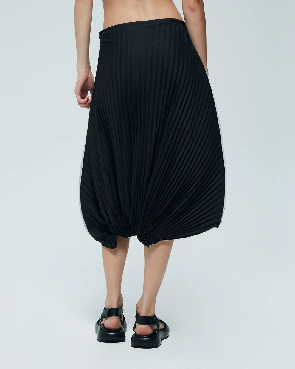 Asymmetric pleated skirt