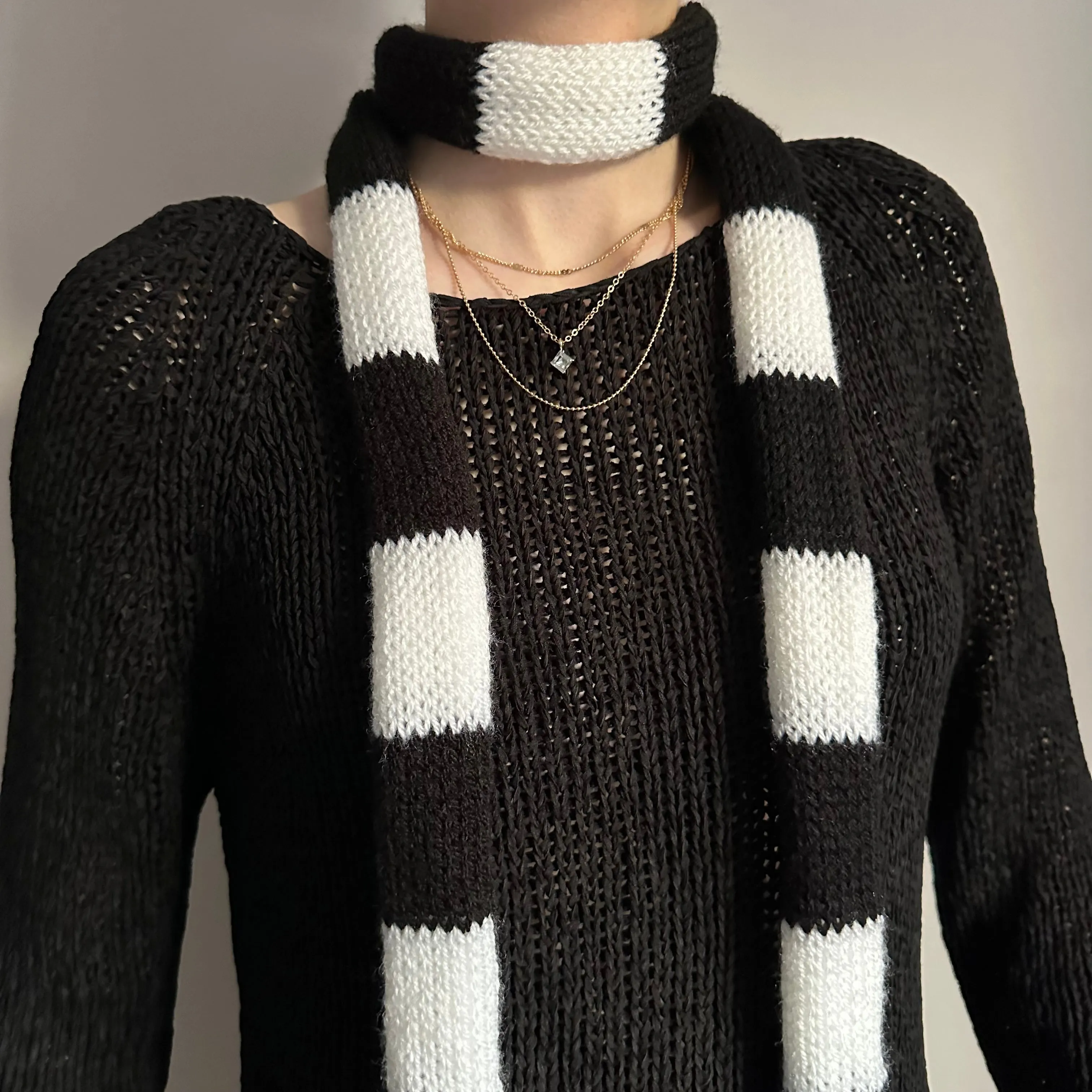 Handmade knitted striped skinny scarf in black and white